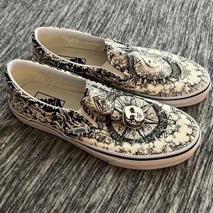 Cream-graphic-designed Vans slip-ons, size 9.5, never been worn, like new.